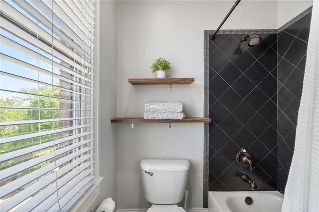 a workspace with furniture and a window