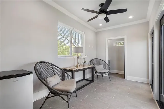 a view of a dinning table and chairs in the patio