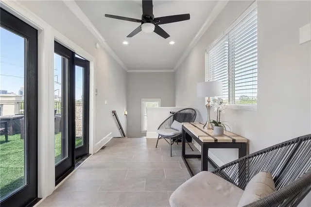 a view of a patio with table and chairs