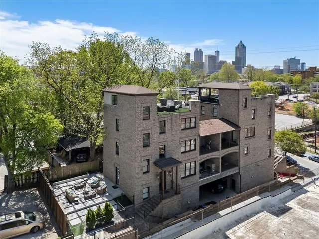 a view of a city with tall buildings