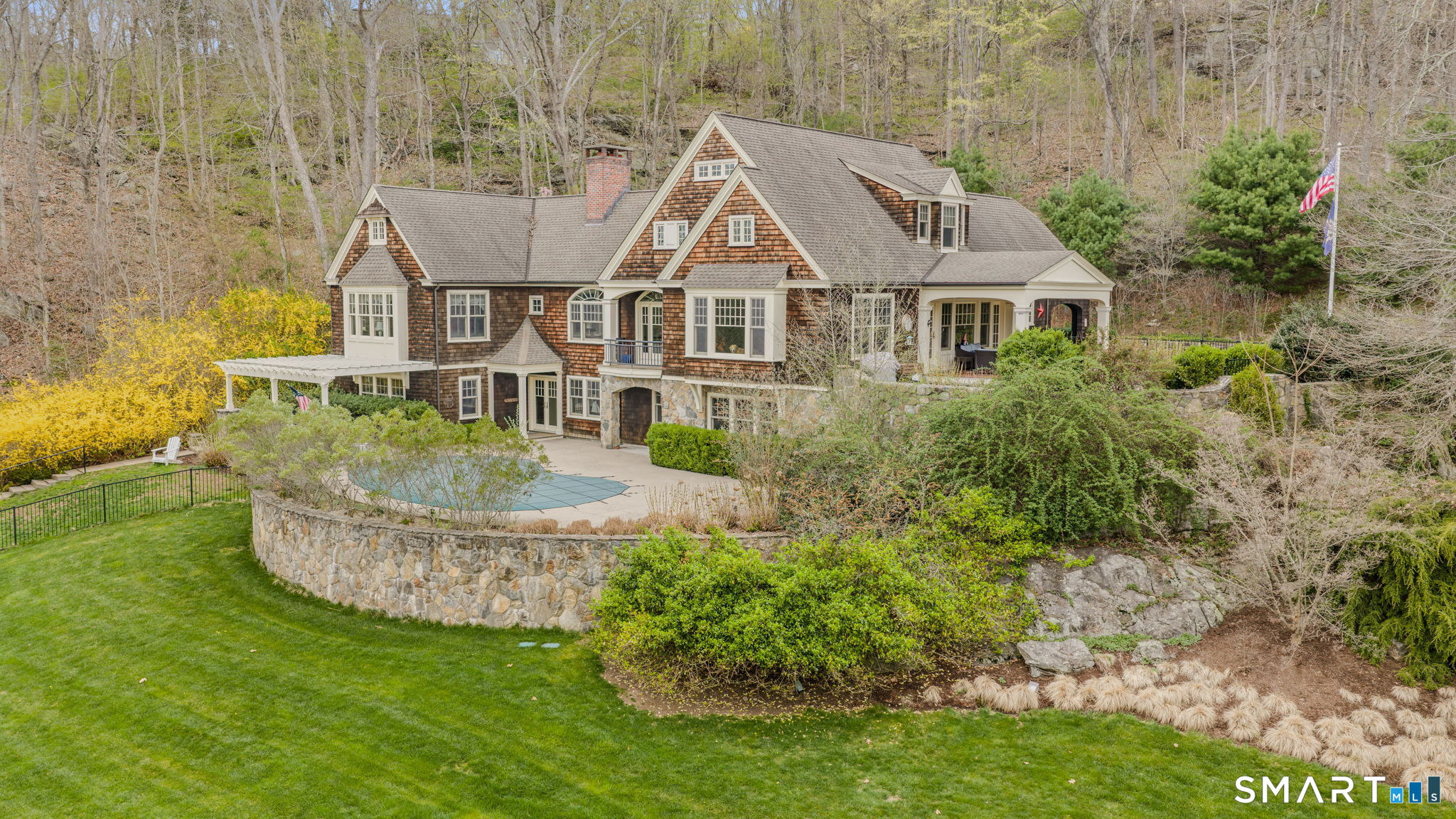 108 Westbrook Road Essex, CT 06409 - Photo 1 of 40 an aerial view of a house with a garden