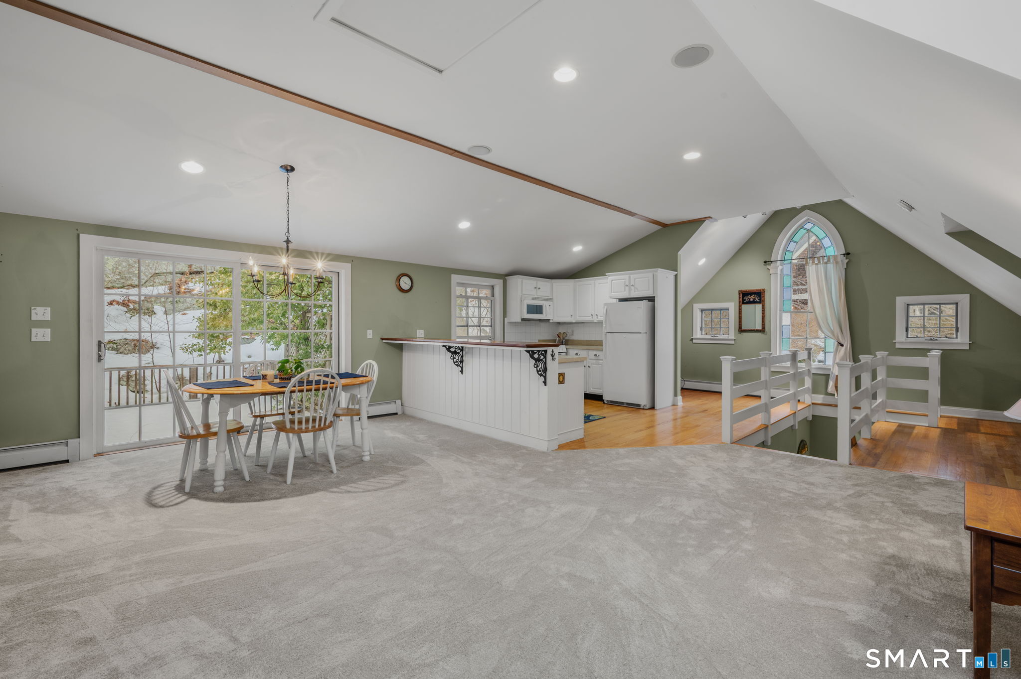 108 Westbrook Road Essex, CT 06409 - Photo 13 of 40 a large kitchen with a table and chairs