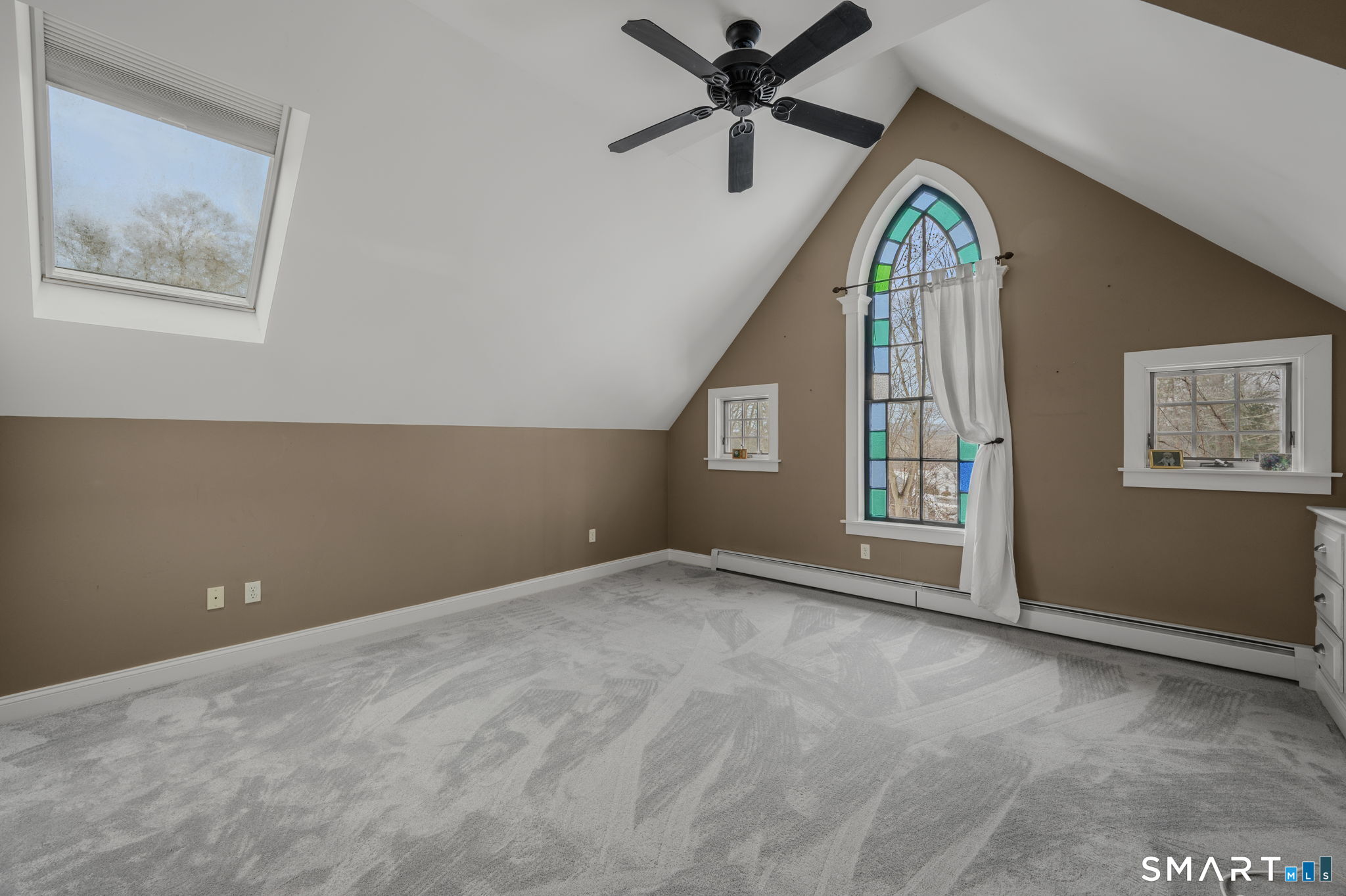 108 Westbrook Road Essex, CT 06409 - Photo 15 of 40 a view of an empty room with a window