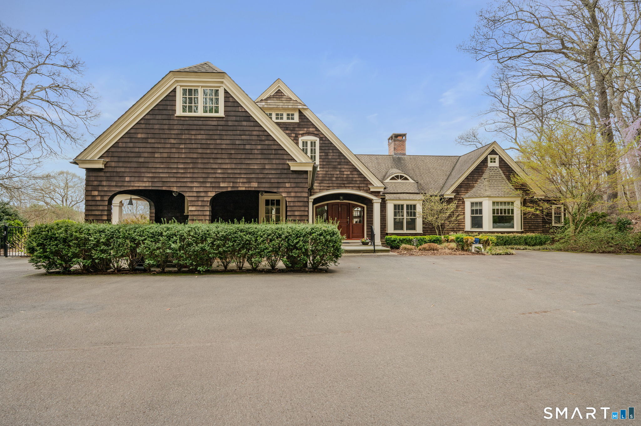 108 Westbrook Road Essex, CT 06409 - Photo 3 of 40 a front view of a house with garden