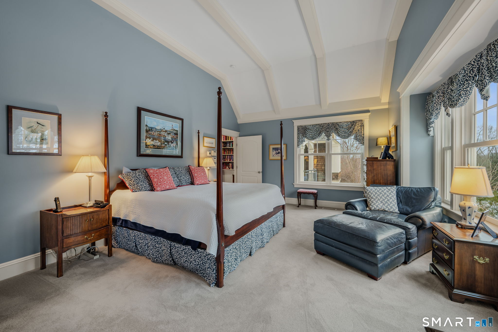 108 Westbrook Road Essex, CT 06409 - Photo 4 of 40 a bedroom with a bed couch and window