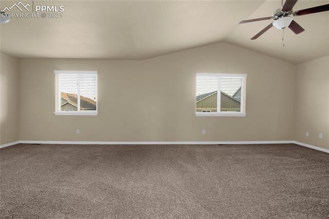 6162 Pilgrimage Road Colorado Springs, CO 80925 - Photo 7 of 19 Enormous 27' x 15' Master Suite