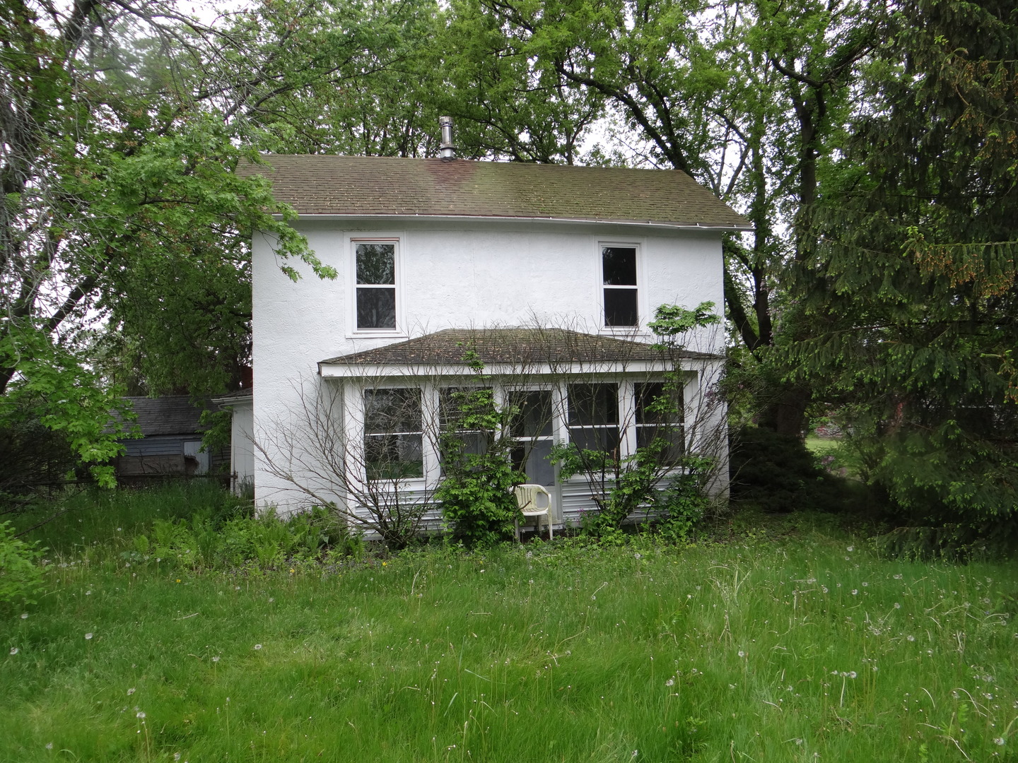 2529 Shaw Road West Brooklyn, IL 61378 - Photo 1 of 15 front view of a house with a yard