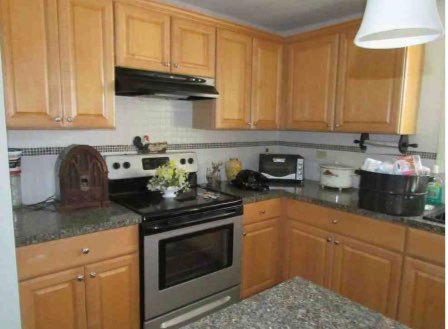 2529 Shaw Road West Brooklyn, IL 61378 - Photo 6 of 15 a kitchen with stainless steel appliances granite countertop a sink stove and cabinets