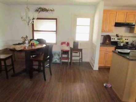 2529 Shaw Road West Brooklyn, IL 61378 - Photo 9 of 15 a view of a dining room with furniture and wooden floor