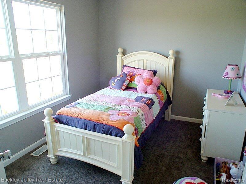 8032 Eagle Ridge Lane Fowlerville, MI 48836 - Photo 7 of 16 Guest Bedroom