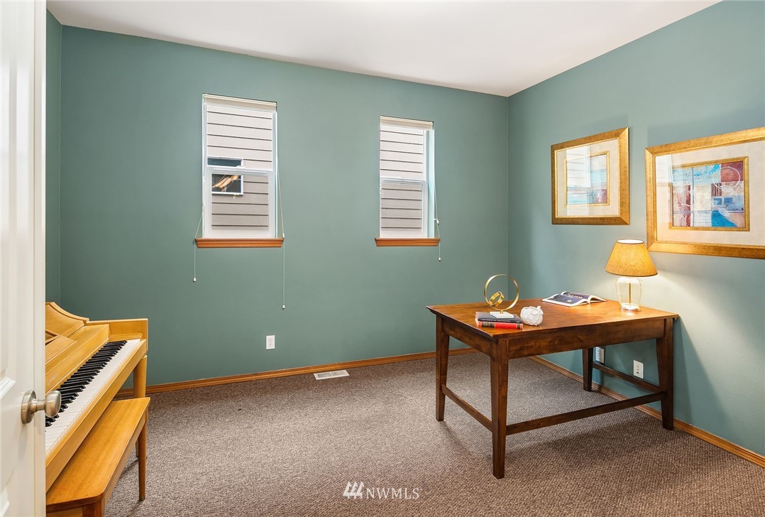3425 183rd Place Southeast Bothell, WA 98012 - Photo 13 of 25 a room with furniture and a window