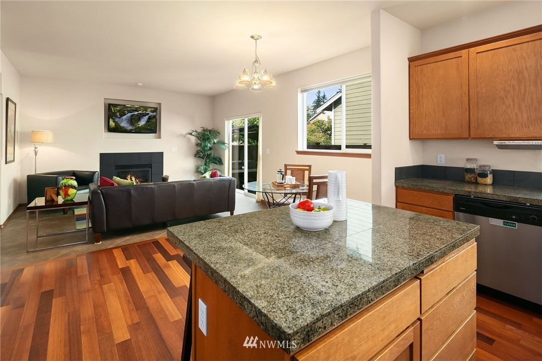 3425 183rd Place Southeast Bothell, WA 98012 - Photo 10 of 25 a kitchen with sink and refrigerator