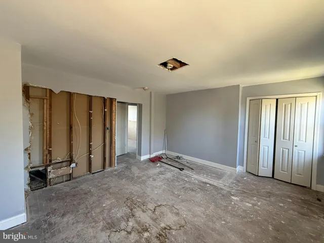 an empty room with windows