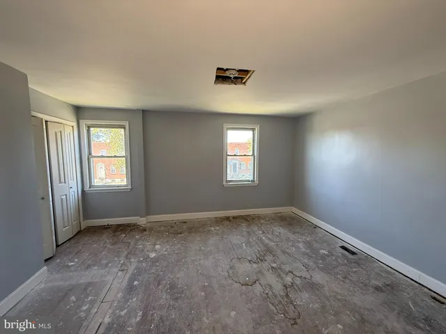 a view of a hallway with a chandelier