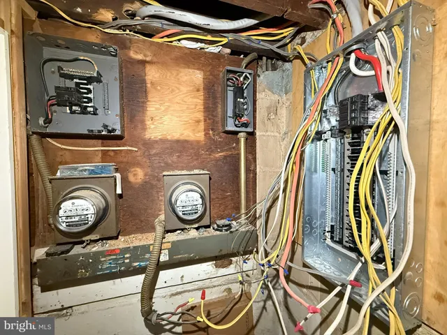 a view of empty room with wooden walls