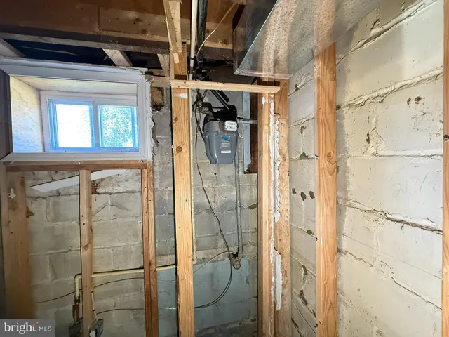 a view of an entryway with wooden floor and glass door