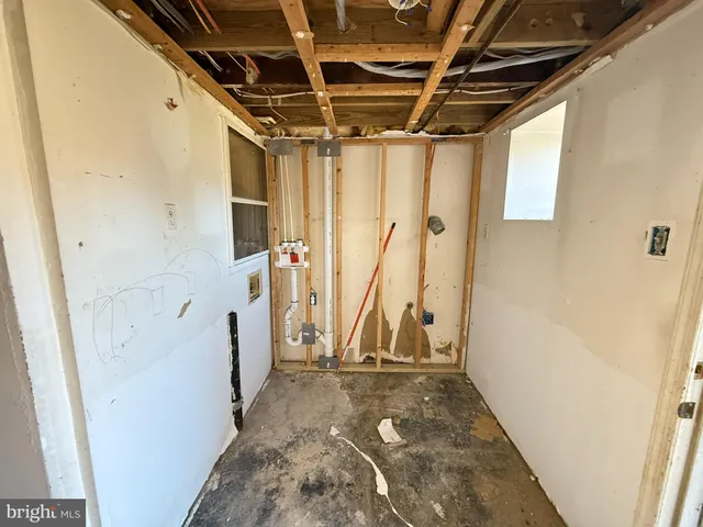 a view of a brick building with many windows