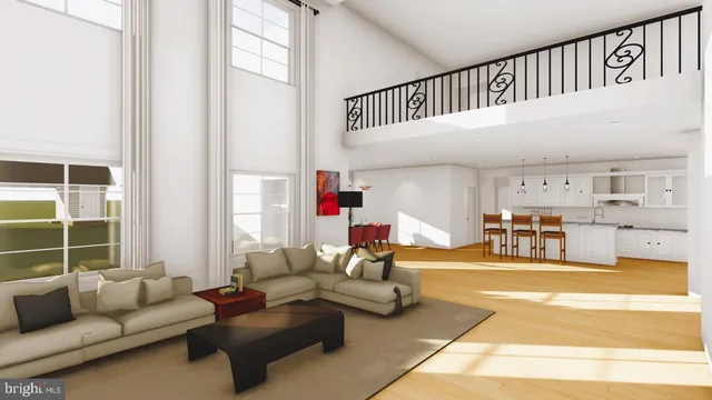 a living room with furniture and a floor to ceiling window