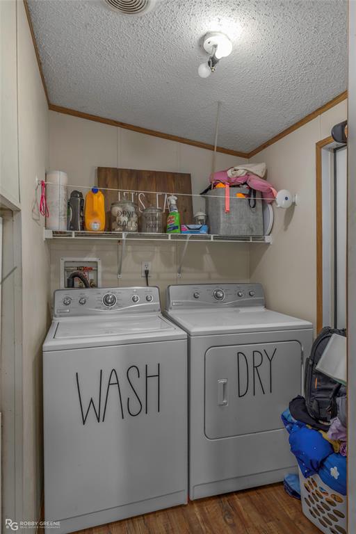10660 Bowen Road Vivian, LA 71082 - Photo 12 of 27 a utility room with washer and dryer