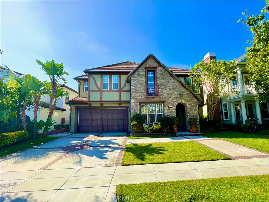 8 Copious Lane Ladera Ranch, CA 92694 - Photo 1 of 1 a front view of a house with a yard