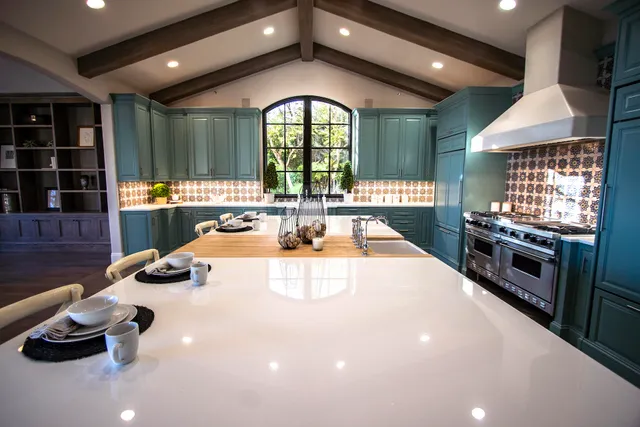 a view of a patio with table and chairs with wooden floor