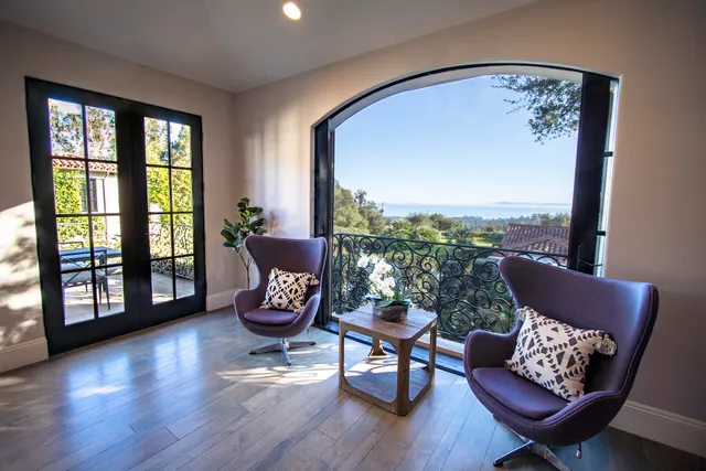 a view of flowing water with large building in front of it