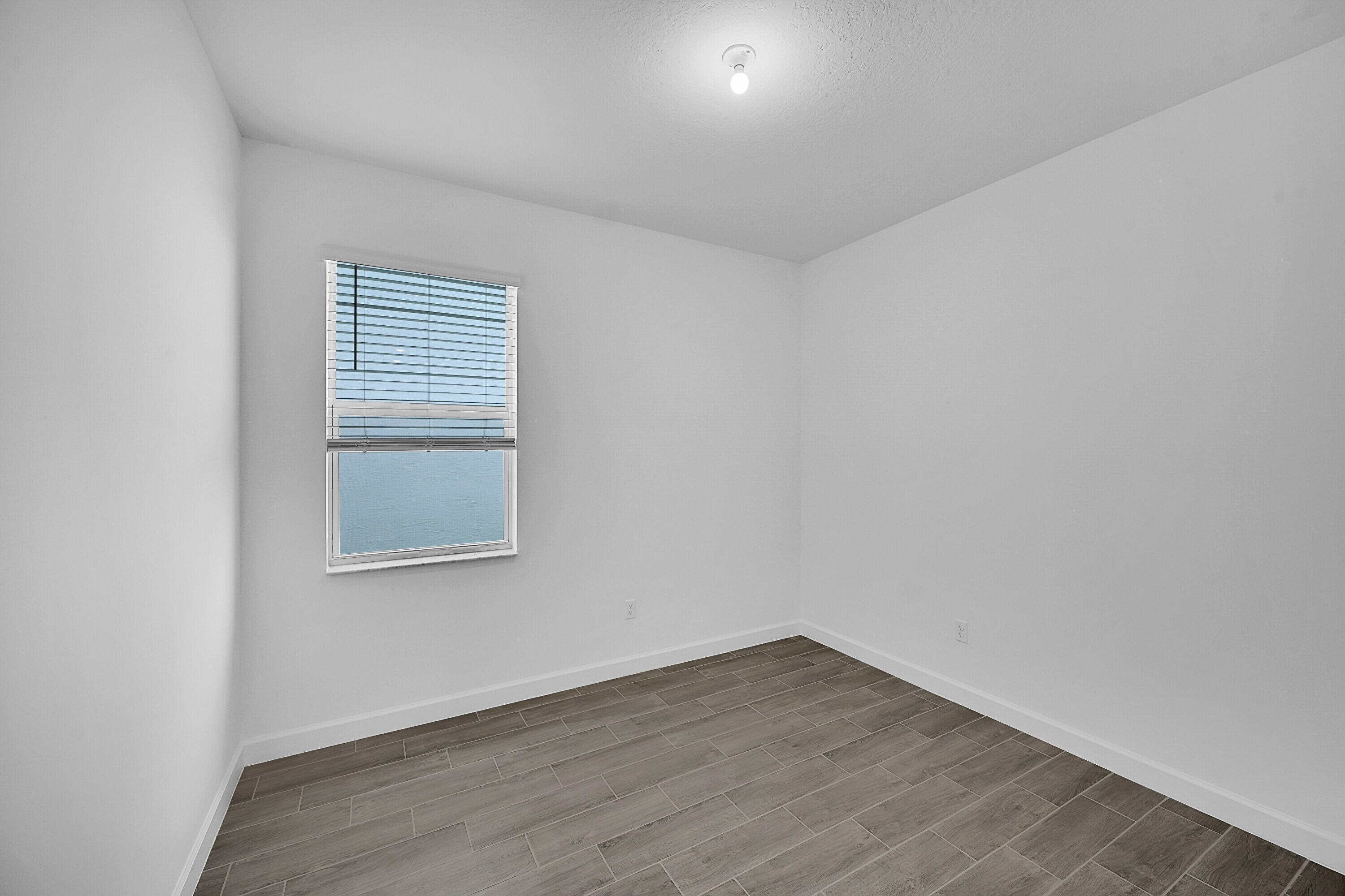 3550 Angler Drive Fort Pierce, FL 34946 - Photo 18 of 31 an empty room with a window