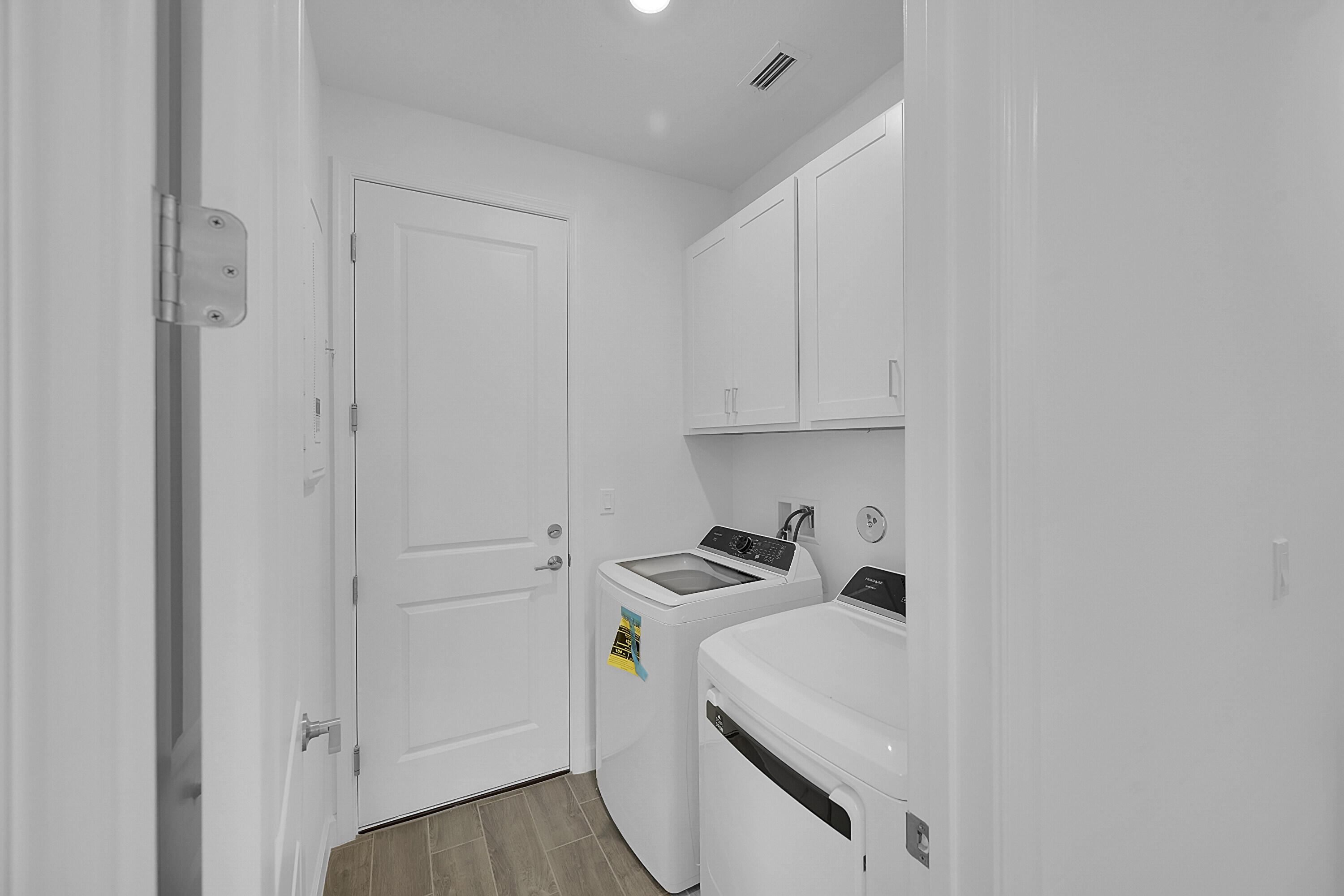 3550 Angler Drive Fort Pierce, FL 34946 - Photo 26 of 31 a view of storage and utility room with washer and dryer