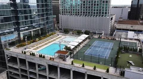 a kitchen with stainless steel appliances granite countertop a stove microwave and refrigerator