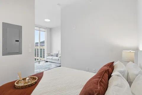 a kitchen with stainless steel appliances granite countertop a stove a refrigerator and a microwave