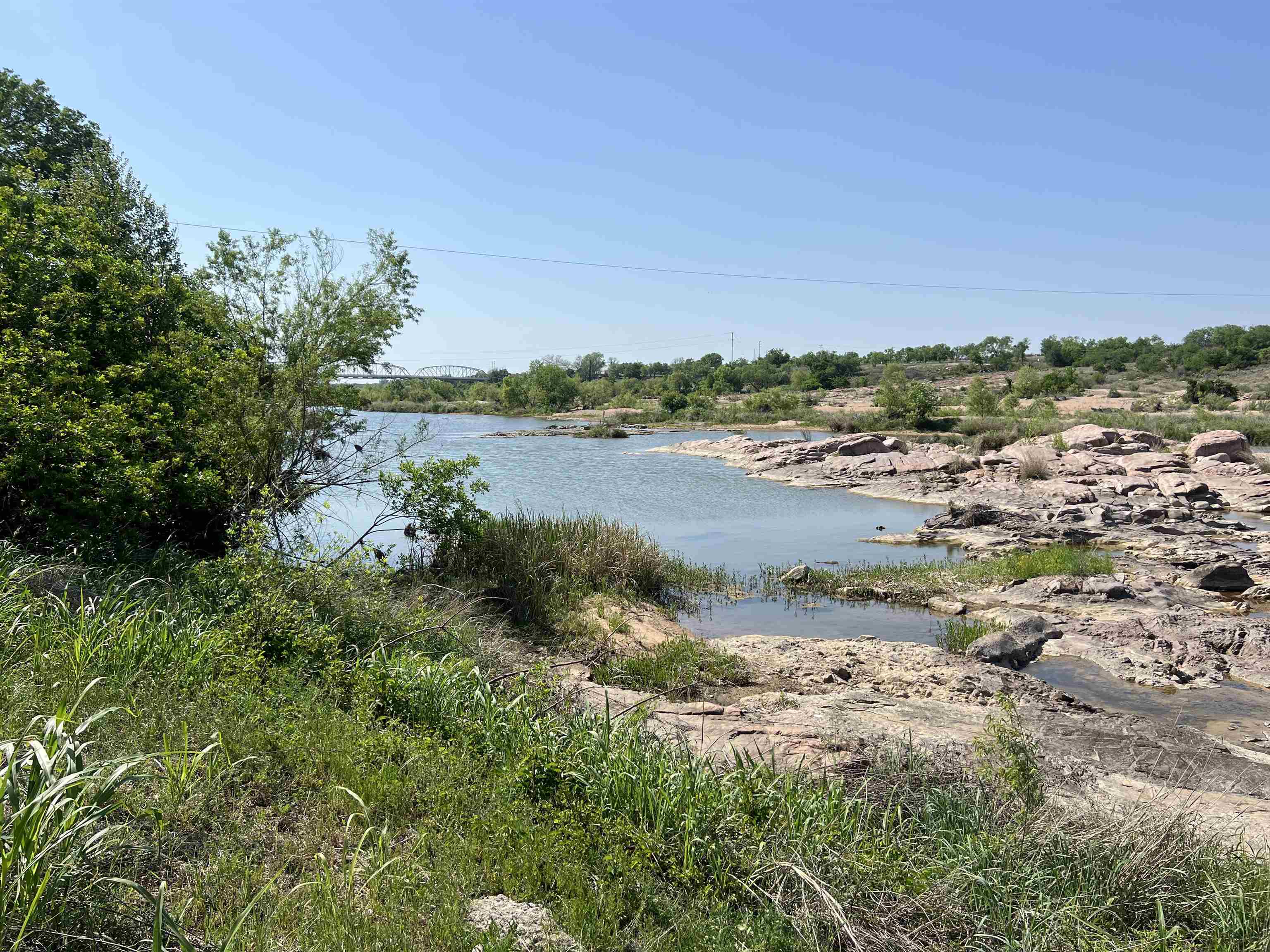 609 East Main Street Llano, TX 78643 - Photo 8 of 24 a view of a lake with beach and city view