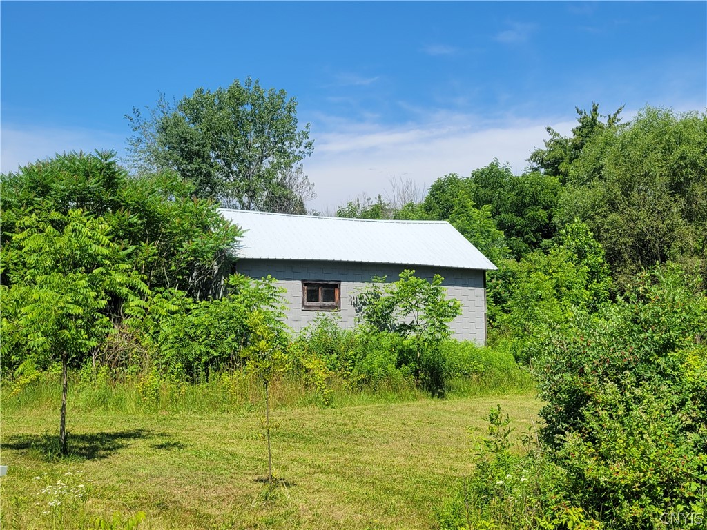 8961 Dinglehole Road Lysander, NY 13027 - Photo 4 of 17 BARNS ARE FULL OF STUFF, EVERYTHING STAYS
