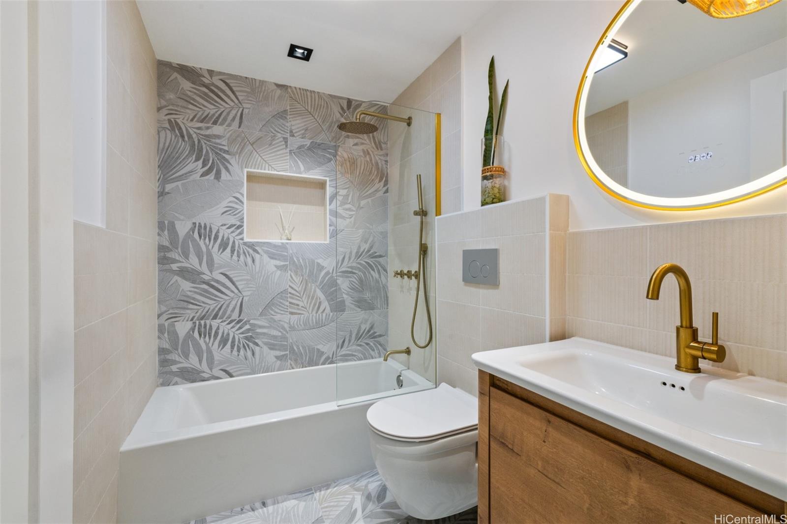 852 Kainoa Place Honolulu, HI 96821 - Photo 14 of 25 a bathroom with a sink and a mirror