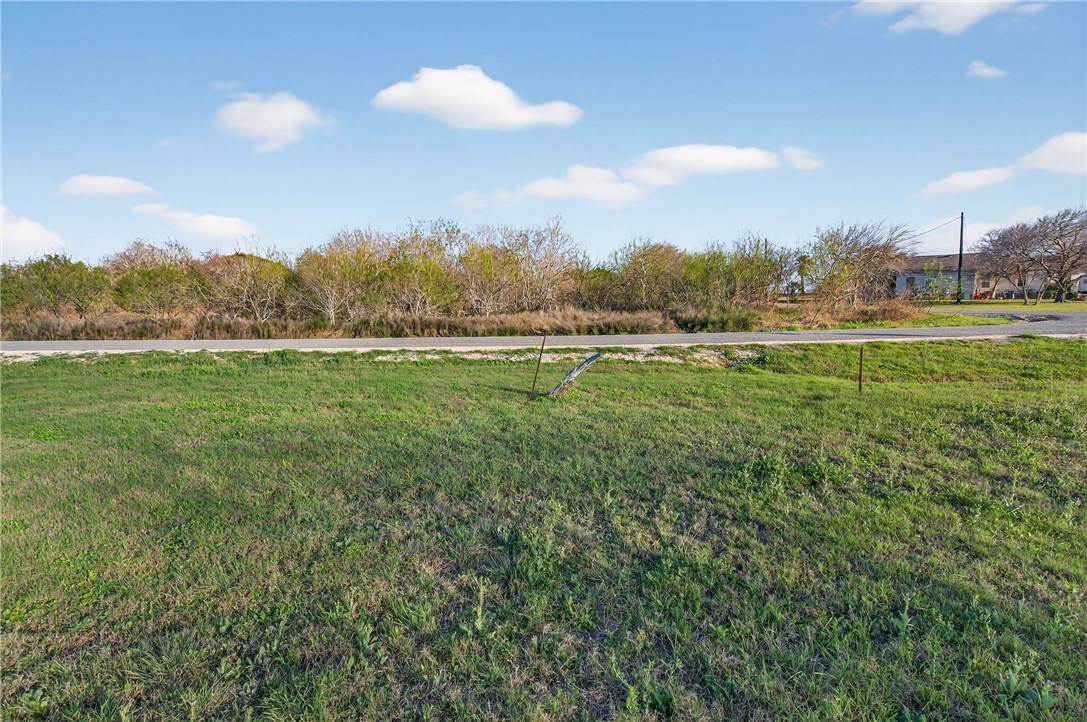 302 1st Street Bayside, TX 78340 - Photo 15 of 19 a view of an ocean and with lots of trees