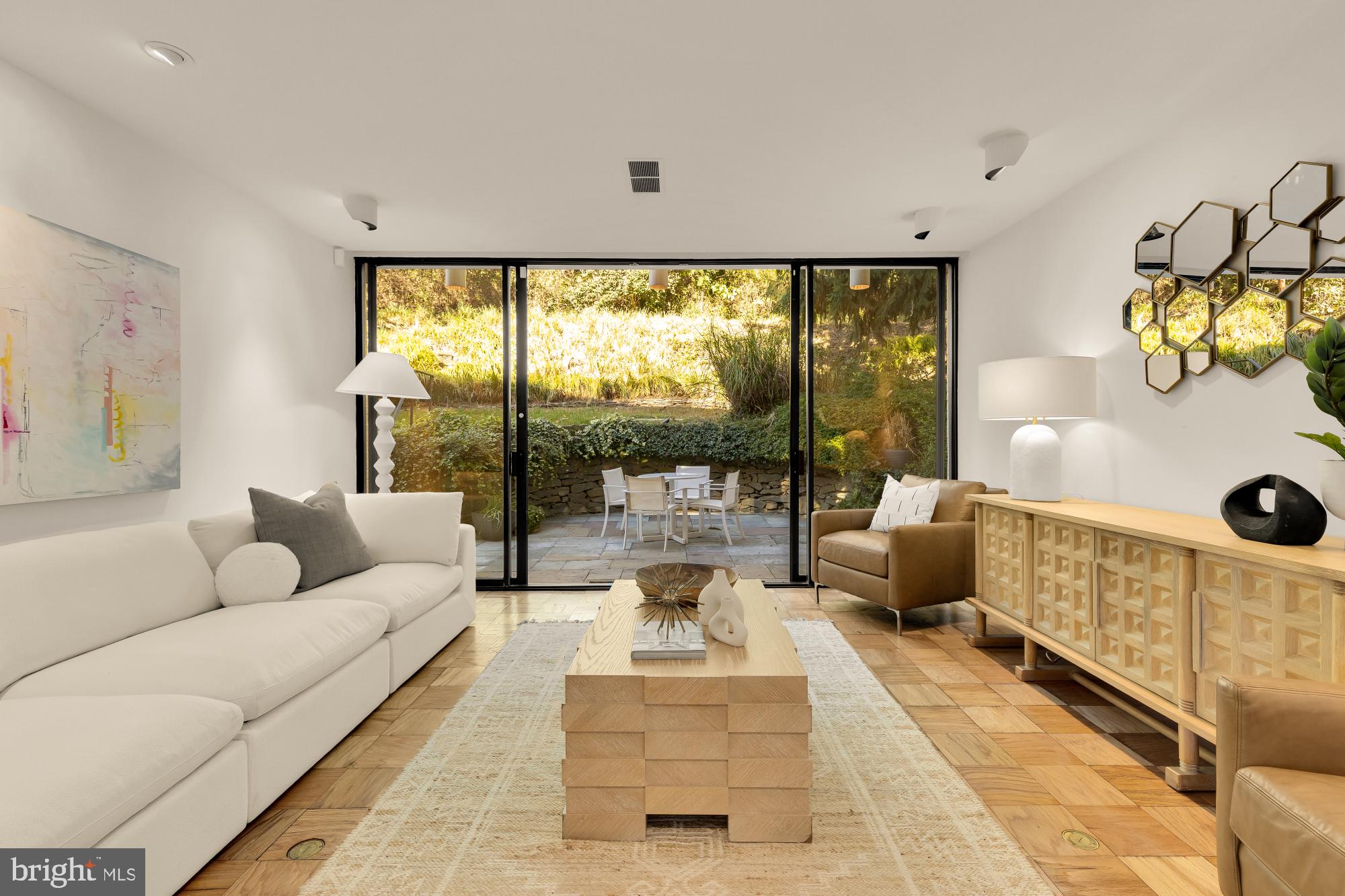 3524 Williamsburg Lane Northwest Washington, DC 20008 - Photo 11 of 49 a living room with furniture and a large window