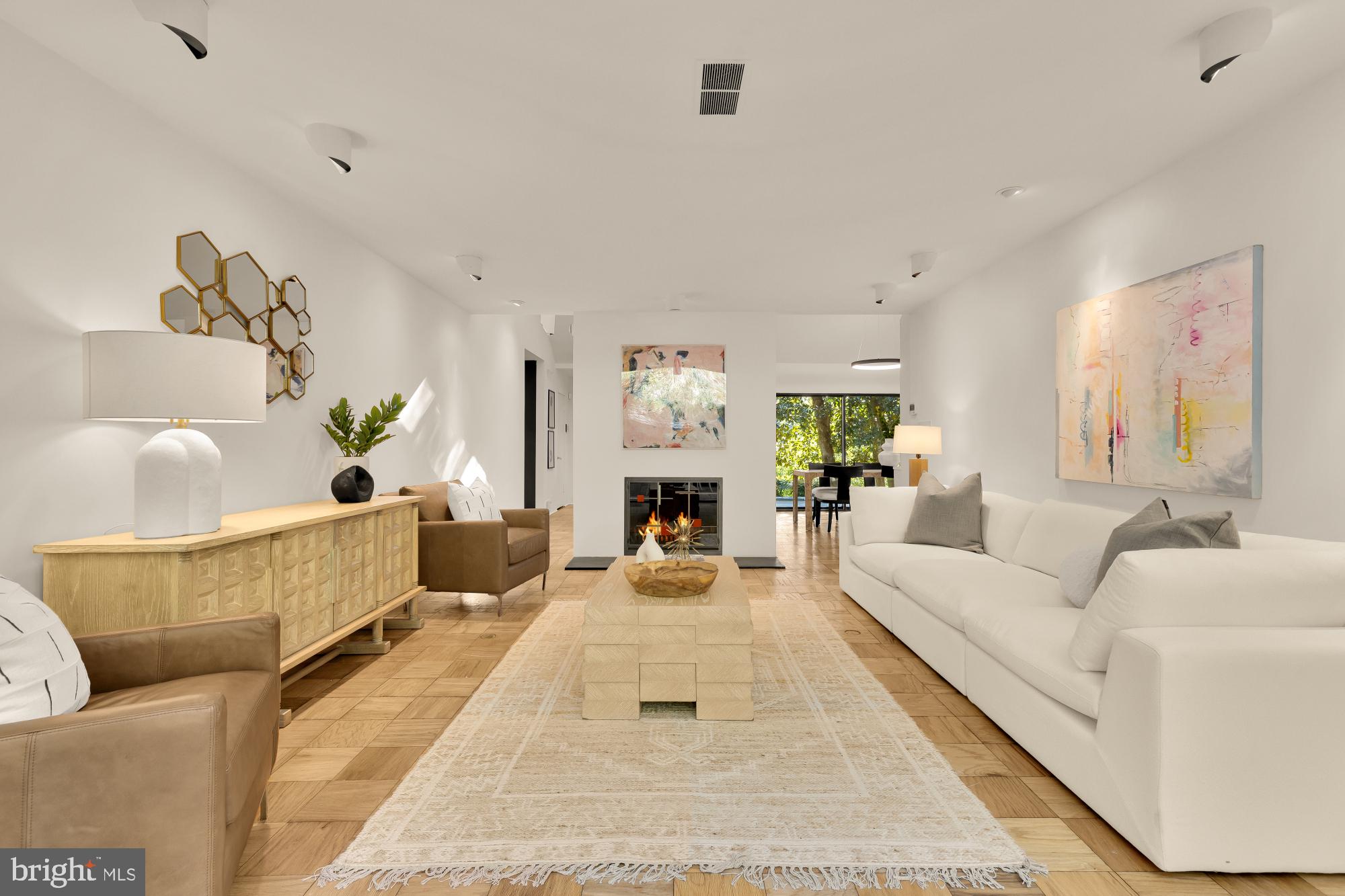 3524 Williamsburg Lane Northwest Washington, DC 20008 - Photo 12 of 49 a living room with furniture and a fireplace