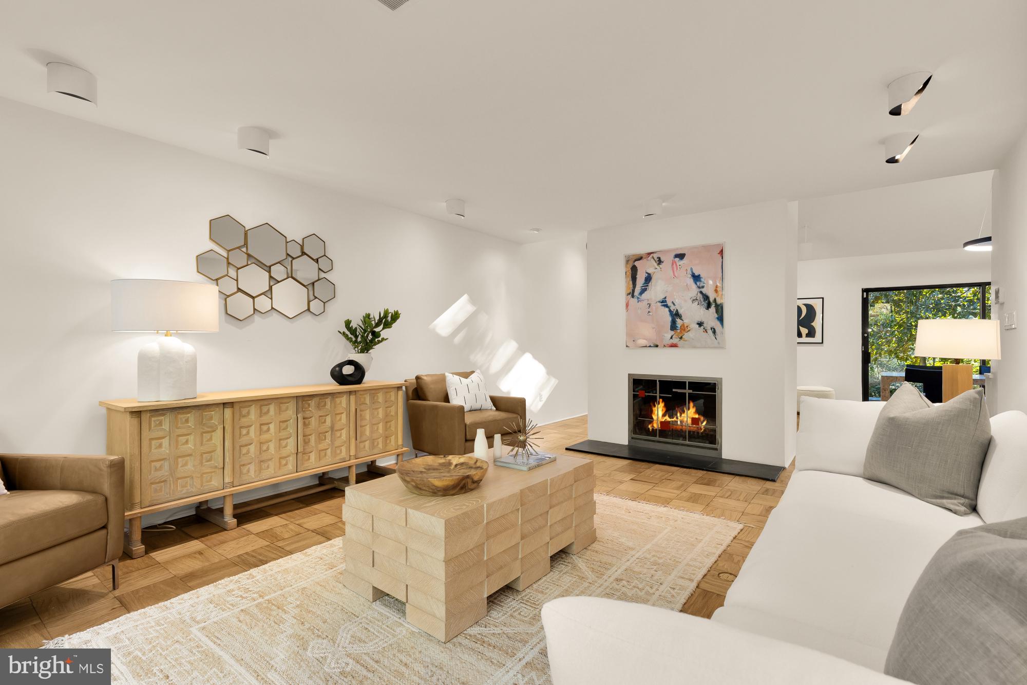 3524 Williamsburg Lane Northwest Washington, DC 20008 - Photo 13 of 49 a living room with furniture and a fireplace