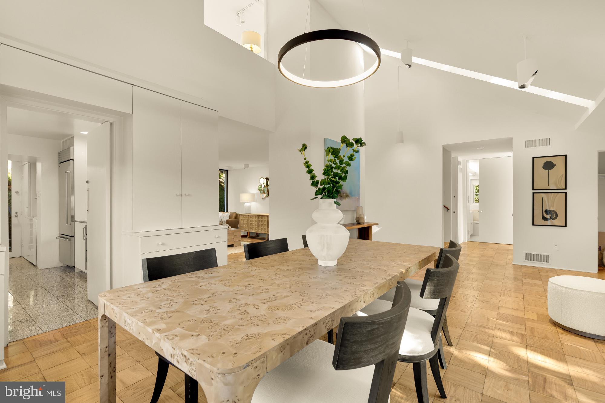 3524 Williamsburg Lane Northwest Washington, DC 20008 - Photo 15 of 49 a view of a dining room with furniture and wooden floor