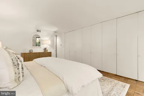 a view of a dinning tables and chairs in a patio