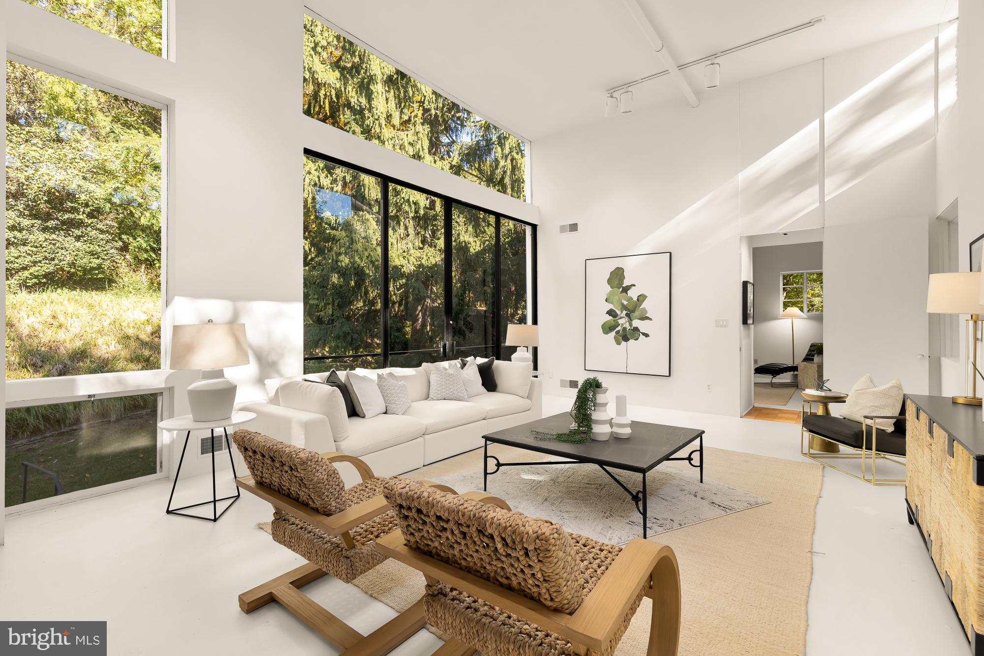 3524 Williamsburg Lane Northwest Washington, DC 20008 - Photo 3 of 49 a living room with furniture and a large window