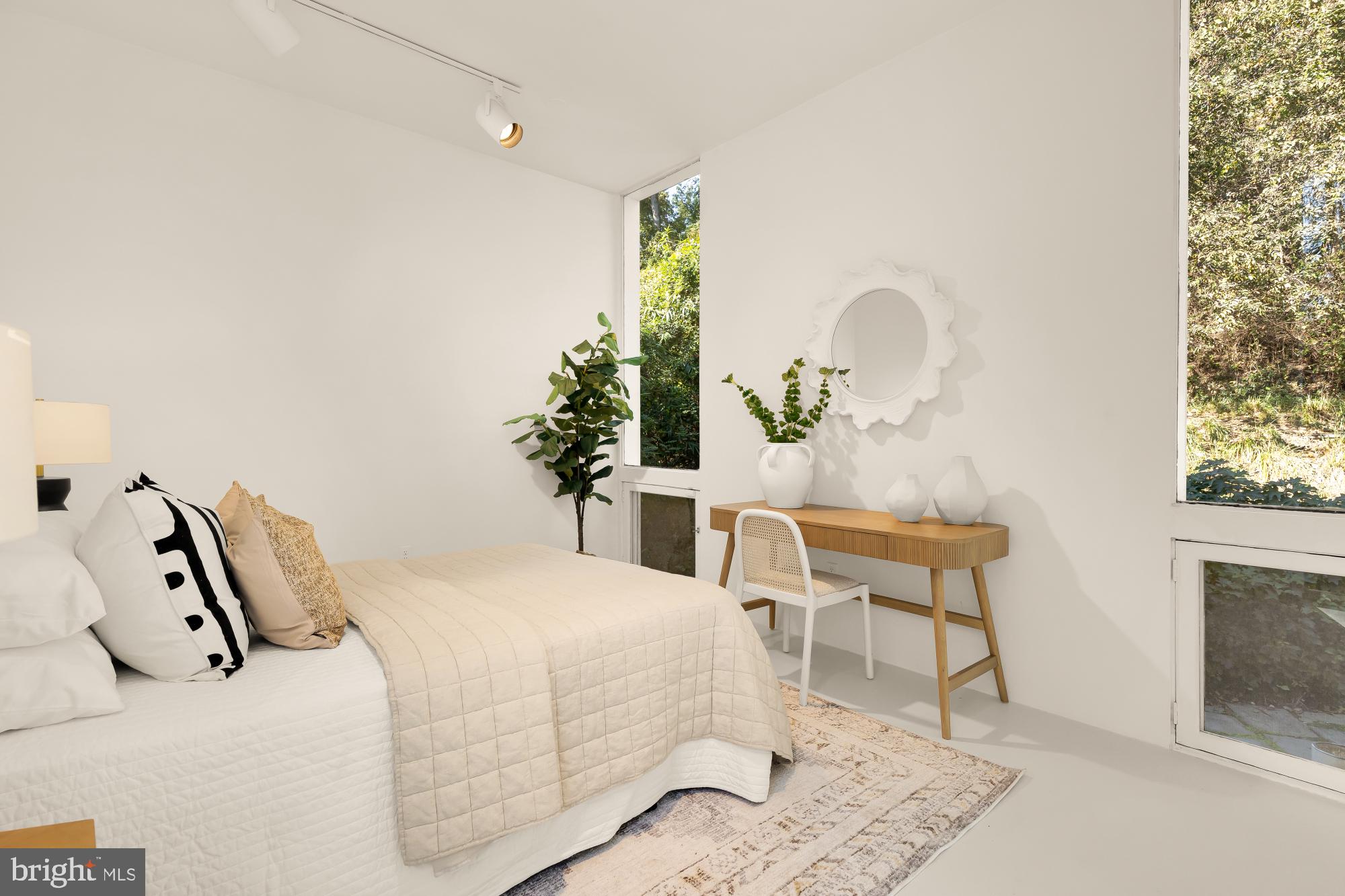 3524 Williamsburg Lane Northwest Washington, DC 20008 - Photo 31 of 49 a bedroom with a bed and a chair