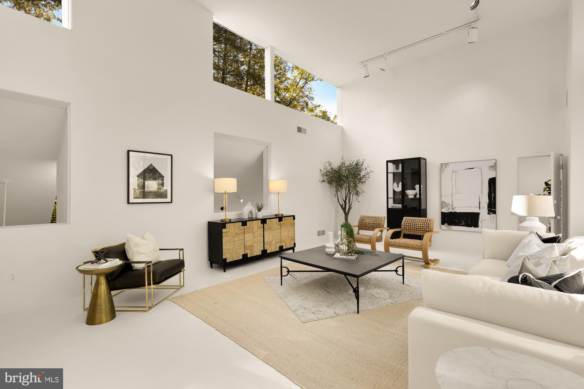3524 Williamsburg Lane Northwest Washington, DC 20008 - Photo 5 of 49 a living room with furniture and a chandelier