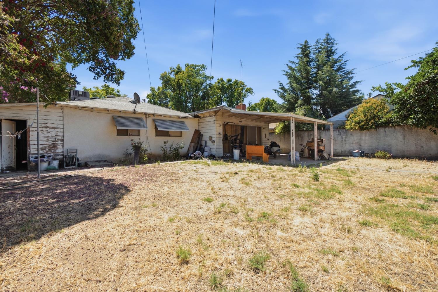 1705 Stetson Avenue Modesto, CA 95350 - Photo 26 of 32 a view of a house with a yard