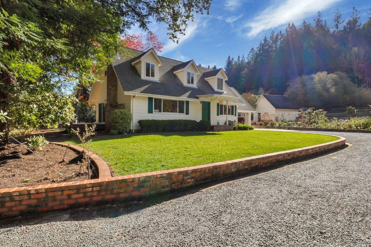 520 Montgomery Road Sebastopol, CA 95472 - Photo 1 of 1 a front view of a house with a yard
