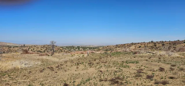 a view of a large building with a view of ocean