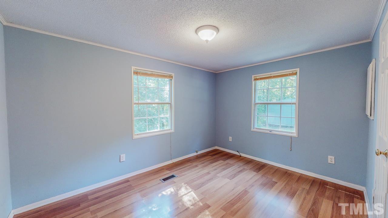 531 Miller Road Timberlake, NC 27583 - Photo 22 of 30 an empty room with a window