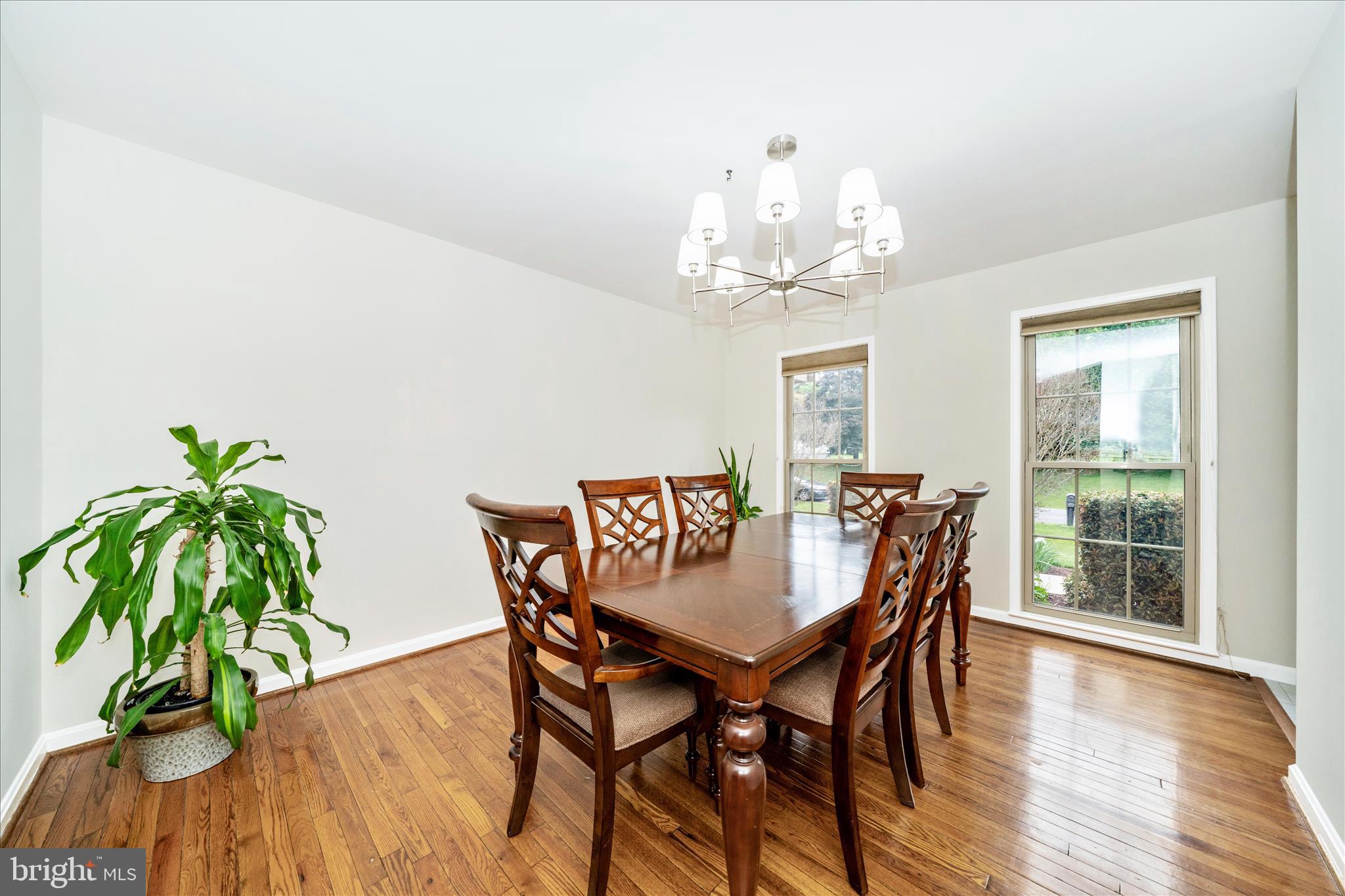 16000 Narrows Terrace Silver Spring, MD 20906 - Photo 5 of 54 a view of a dining room with furniture window and wooden floor