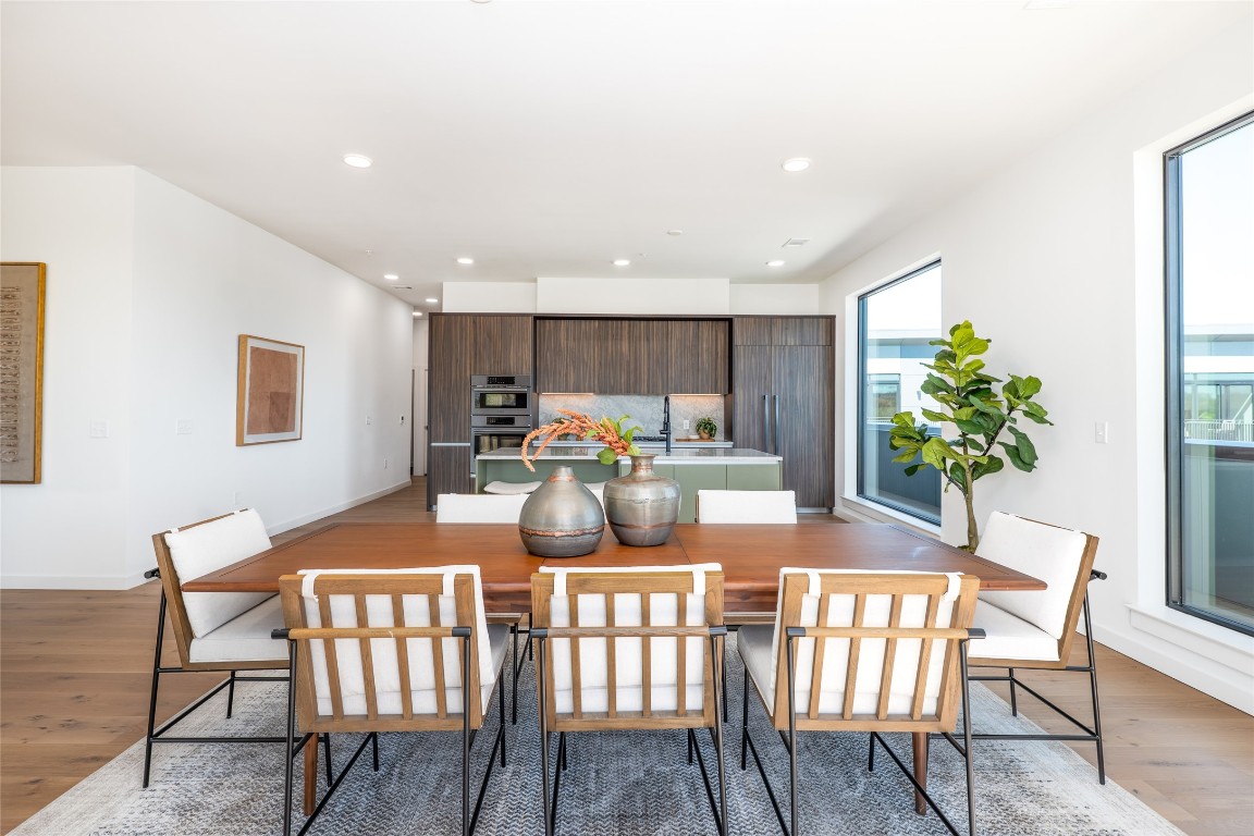 2209 South 1st Street, Unit 407 Austin, TX 78704 - Photo 5 of 30 a dining room with furniture and window
