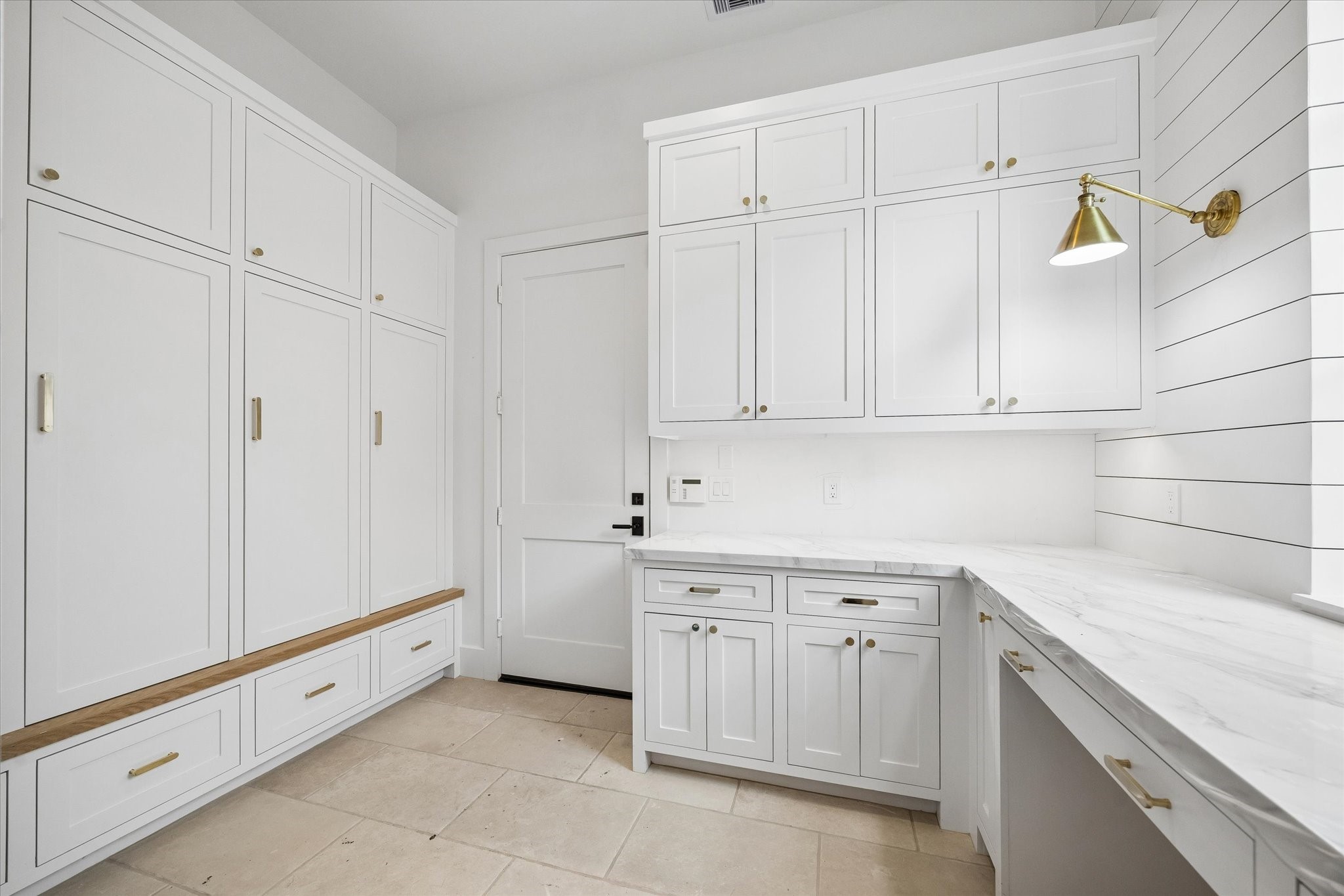1328 Mickey Way Spring Valley Village, TX 77055 - Photo 11 of 26 Mud room just off garage with lockers and command center/work space. Pictured April 2026.