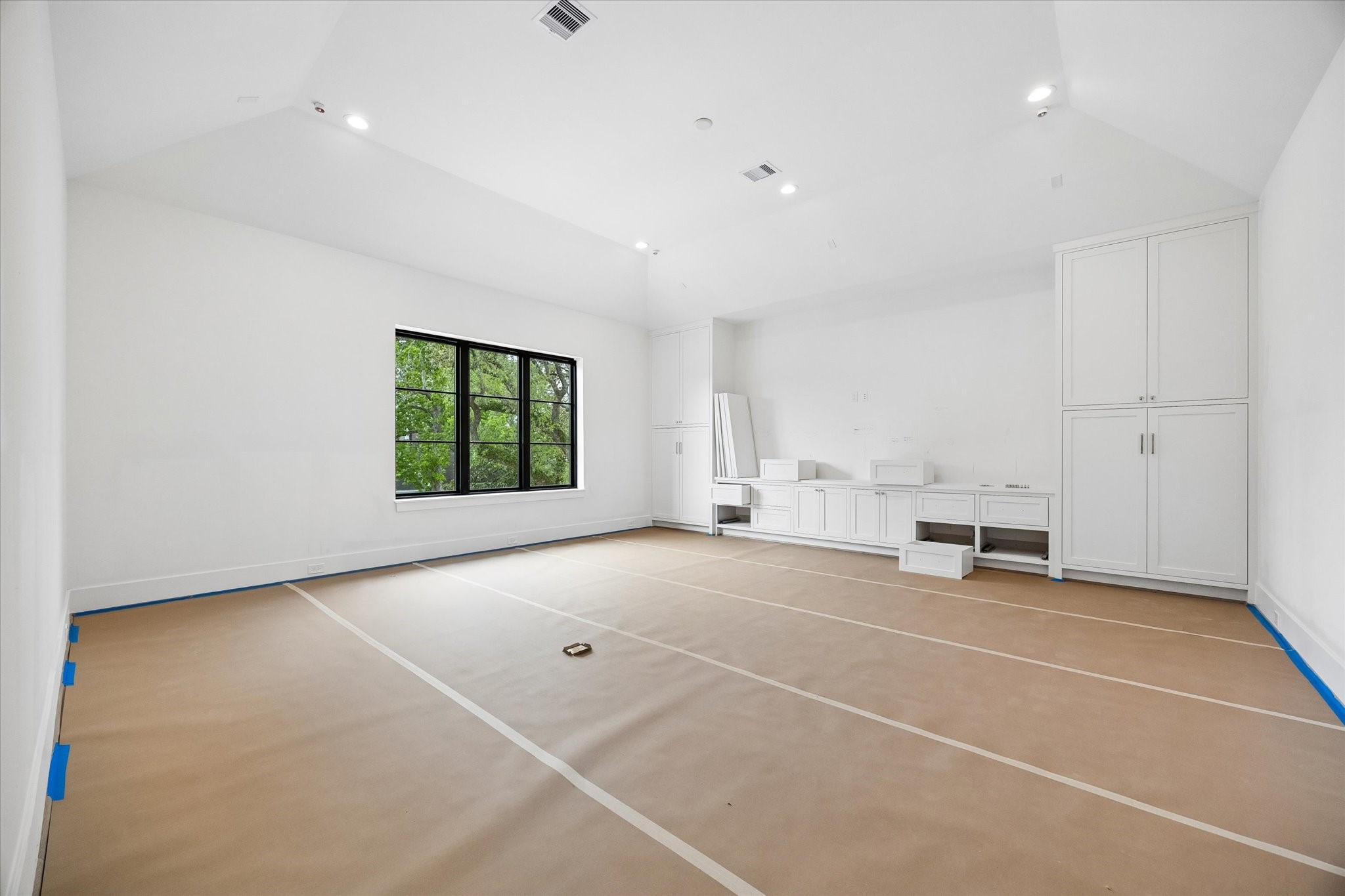 1328 Mickey Way Spring Valley Village, TX 77055 - Photo 12 of 26 Spacious game room with custom cabinetry. Pictured April 2026.